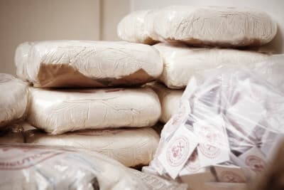 Drug packages raw opium drug dozens and weapons seized by police